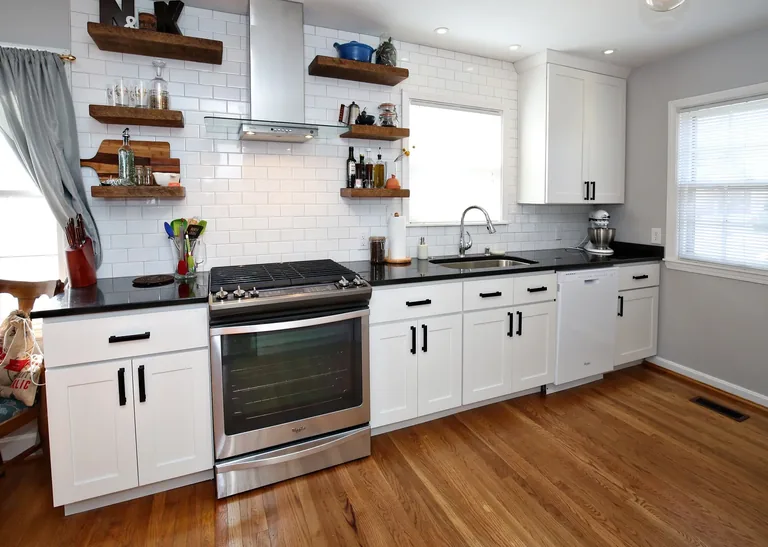 Classic Shaker White 5-piece kitchen with subway tile backsplash and open wood shelving